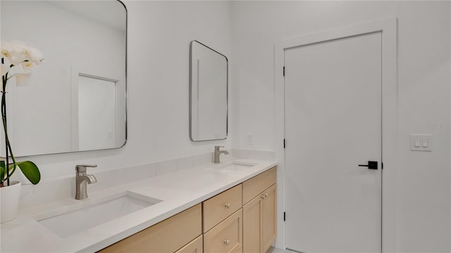 full bathroom featuring double vanity