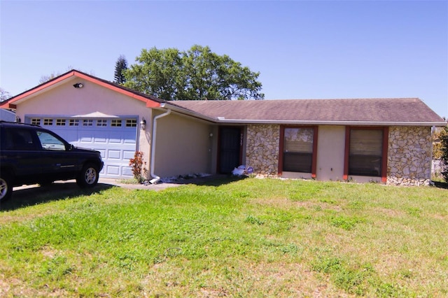 ranch-style house with stucco siding, stone siding, a front yard, and an attached garage