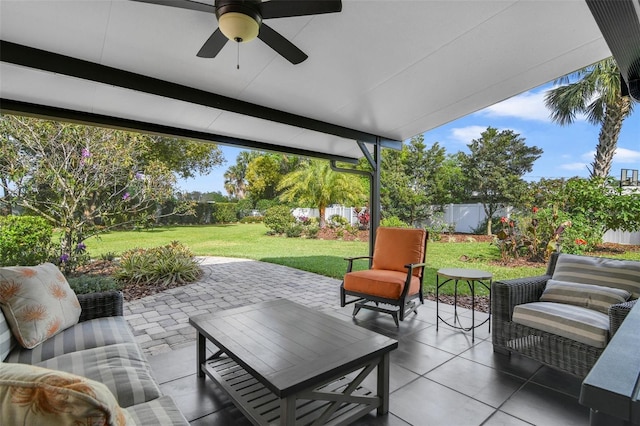 view of patio / terrace with a fenced backyard, outdoor lounge area, and a ceiling fan