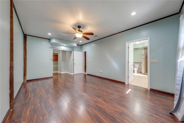 unfurnished bedroom featuring recessed lighting, wood finished floors, baseboards, and ornamental molding