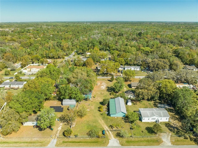 bird's eye view featuring a view of trees