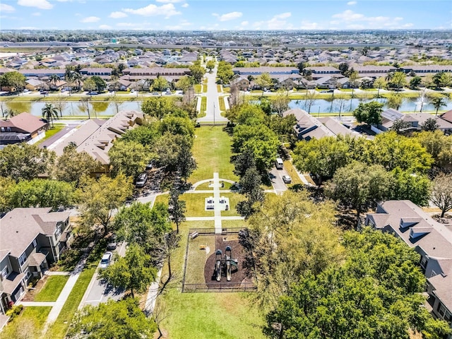 aerial view with a residential view and a water view