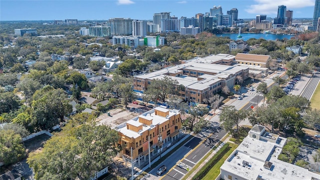 drone / aerial view with a view of city and a water view