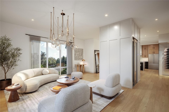 living room featuring a notable chandelier, recessed lighting, and light wood-style flooring