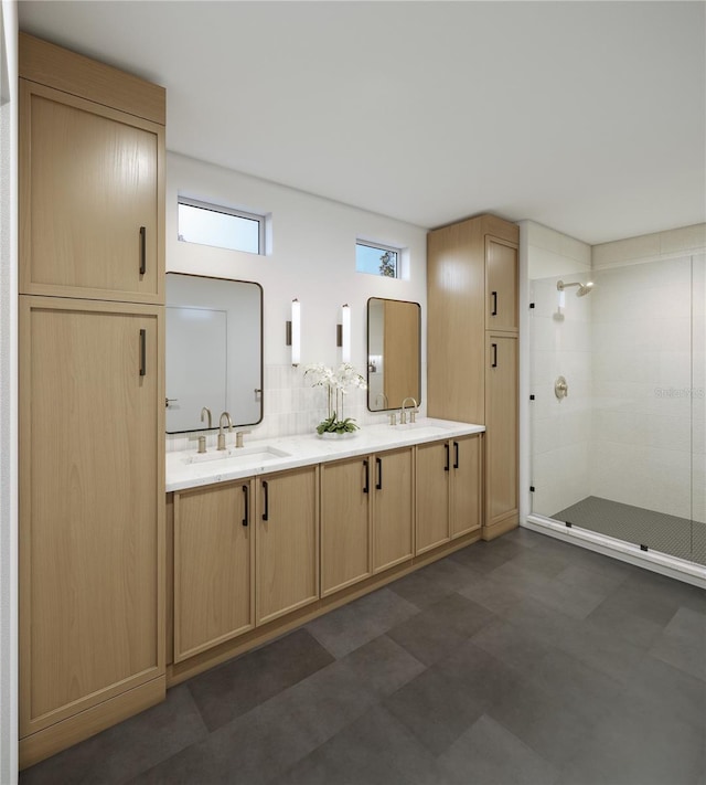 full bath featuring a sink, double vanity, and a shower stall