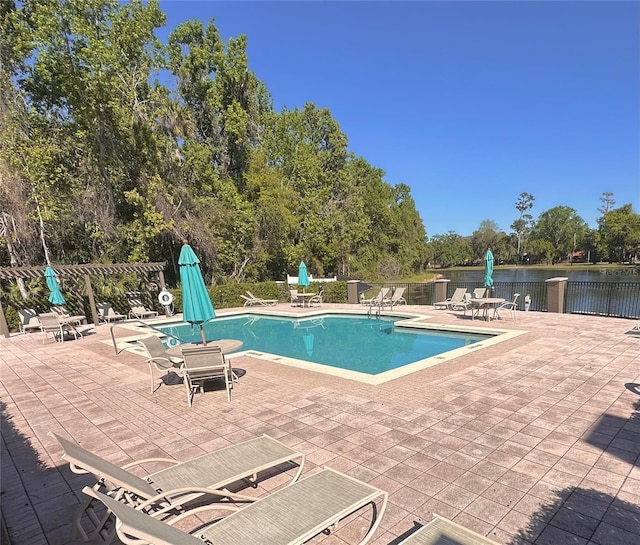 413 Summit Ridge Pl Unit 115, Longwood, FL 32779 - community pool with a patio and a water view
