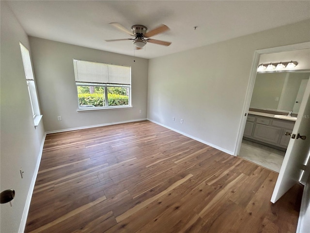 413 Summit Ridge Pl Unit 115, Longwood, FL 32779 - spare room with ceiling fan and wood-type flooring