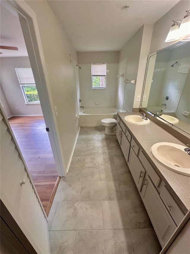 413 Summit Ridge Pl Unit 115, Longwood, FL 32779 - bathroom featuring double vanity and shower / bath combination