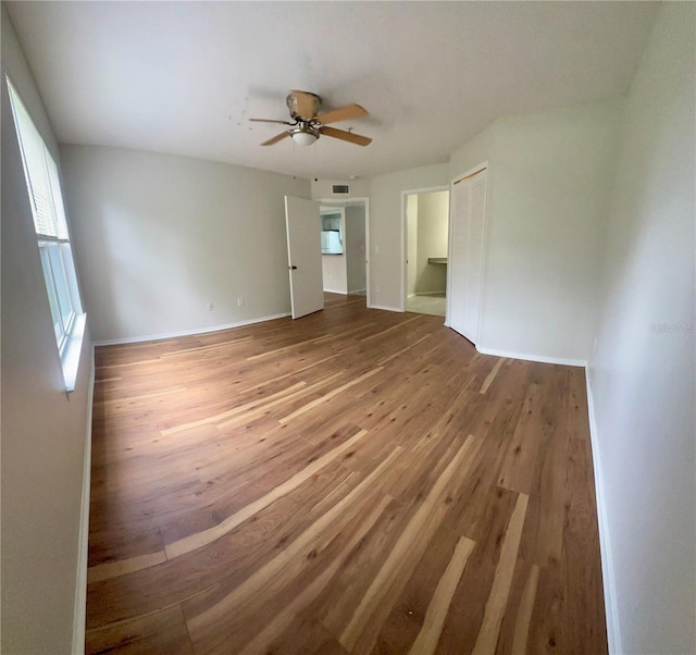413 Summit Ridge Pl Unit 115, Longwood, FL 32779 - spare room featuring hardwood / wood-style flooring and ceiling fan