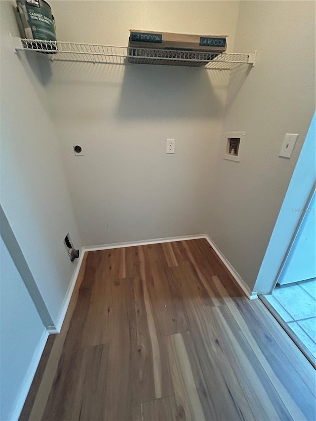 413 Summit Ridge Pl Unit 115, Longwood, FL 32779 - washroom featuring hookup for an electric dryer, hookup for a washing machine, and wood finished floors