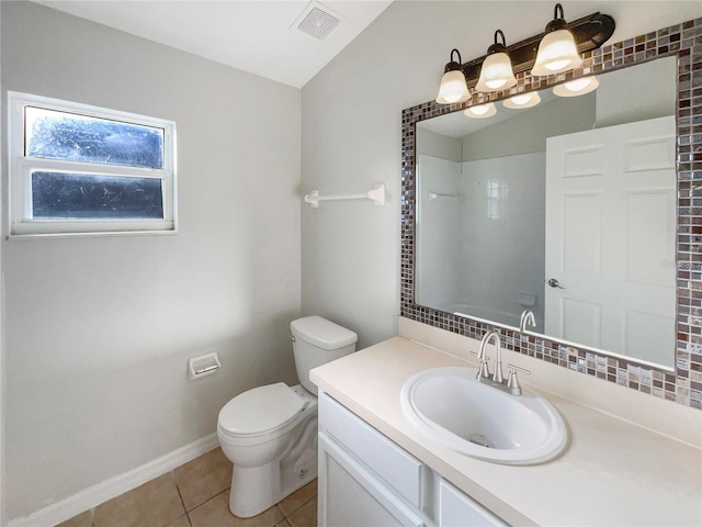 bathroom with vanity, visible vents, a shower, tile patterned floors, and toilet