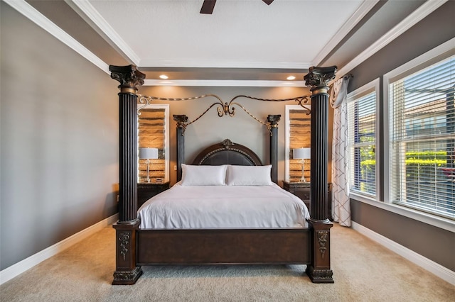 bedroom featuring crown molding, baseboards, and carpet floors