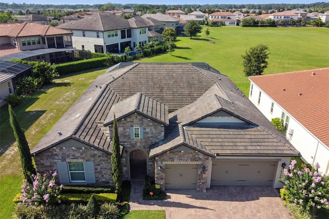 birds eye view of property with a residential view