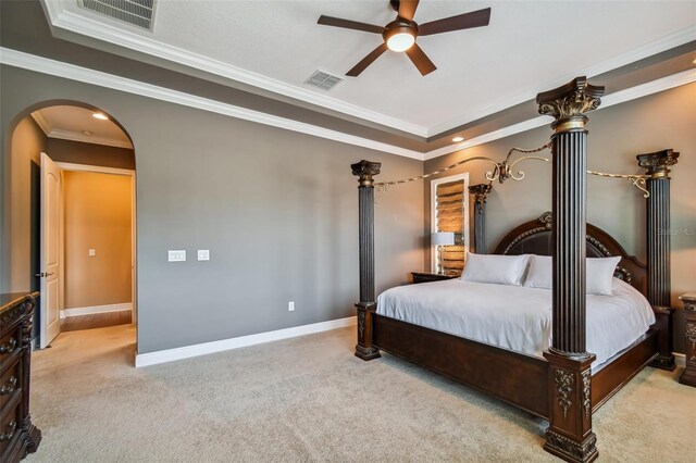 16736 Broadwater Ave, Winter Garden, FL 34787 - carpeted bedroom with arched walkways, ornamental molding, and ceiling fan