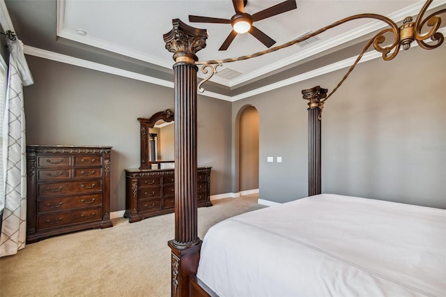 16736 Broadwater Ave, Winter Garden, FL 34787 - bedroom featuring ornamental molding, carpet, arched walkways, a tray ceiling, and ceiling fan