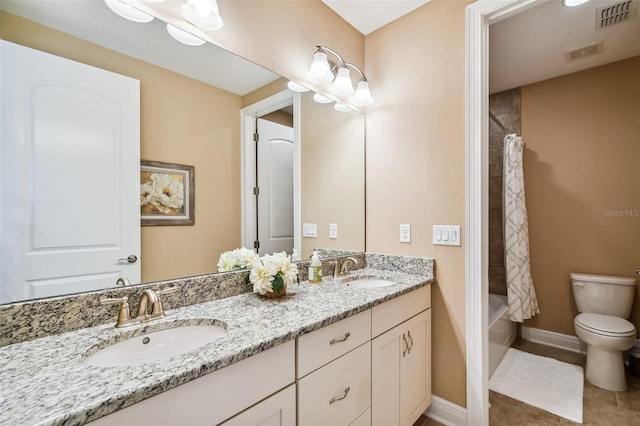 16736 Broadwater Ave, Winter Garden, FL 34787 - bathroom featuring double vanity, shower / bath combo with shower curtain, and tile patterned flooring