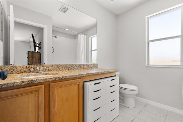 full bathroom with visible vents, toilet, tile patterned flooring, baseboards, and vanity