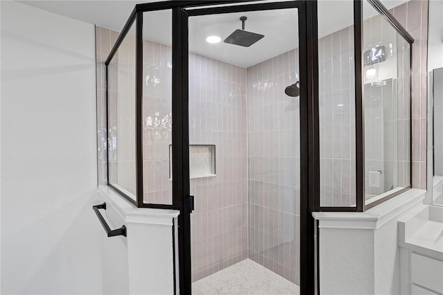 full bath featuring a shower stall