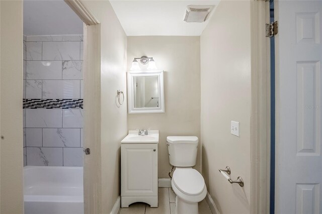 5210 Grandview Dr, Orlando, FL 32808 - bathroom with visible vents, baseboards, washtub / shower combination, toilet, and vanity