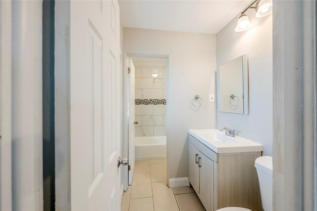 5210 Grandview Dr, Orlando, FL 32808 - bathroom with tile patterned floors, toilet, vanity, and bathing tub / shower combination