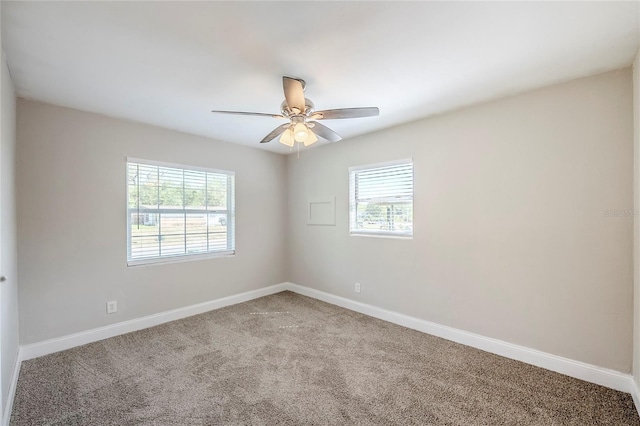 5210 Grandview Dr, Orlando, FL 32808 - spare room with carpet flooring, ceiling fan, and baseboards