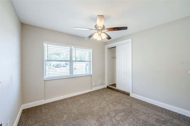 5210 Grandview Dr, Orlando, FL 32808 - unfurnished bedroom featuring a closet, baseboards, and carpet