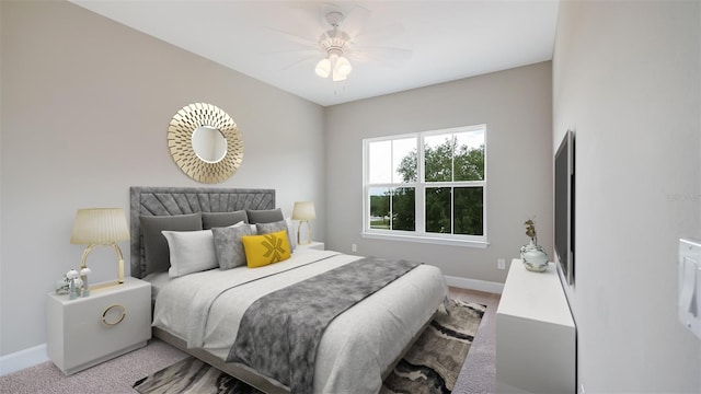 bedroom featuring light carpet, baseboards, and ceiling fan