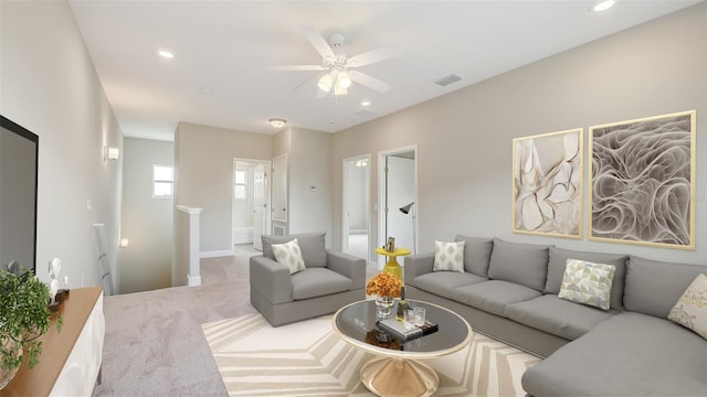 living area with visible vents, recessed lighting, a ceiling fan, and carpet floors