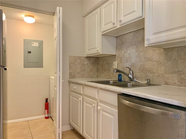 kitchen with electric panel, decorative backsplash, dishwasher, and a sink