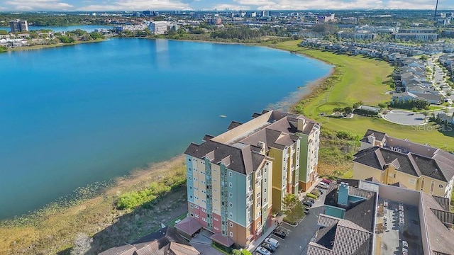 aerial view featuring a view of city and a water view