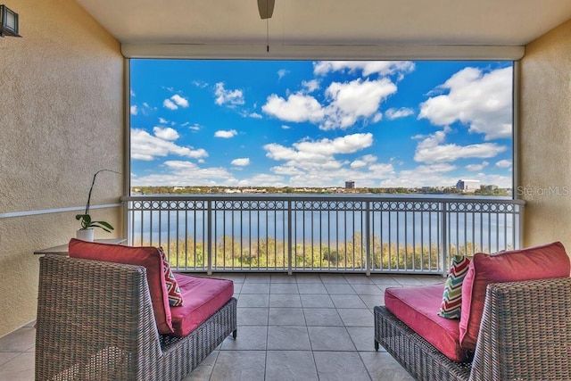 balcony featuring a water view