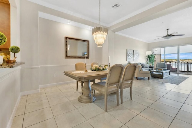 dining space with visible vents, baseboards, light tile patterned flooring, crown molding, and ceiling fan with notable chandelier