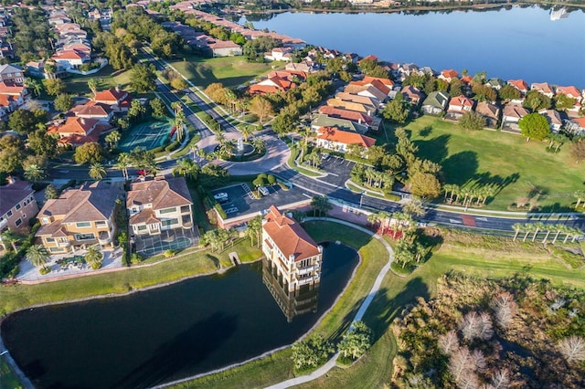 aerial view with a residential view and a water view