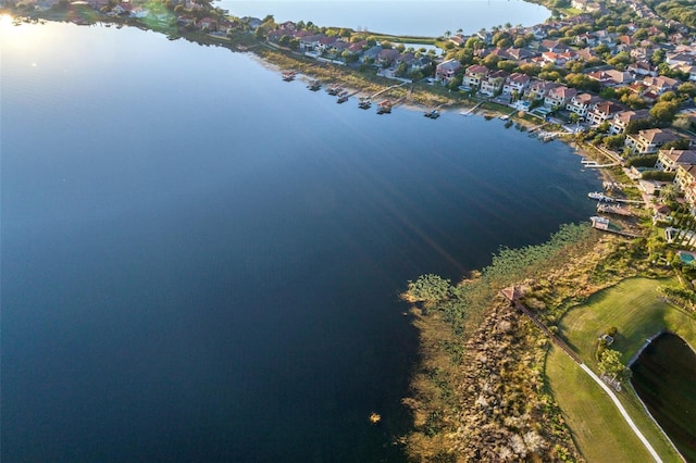 bird's eye view with a water view and a residential view