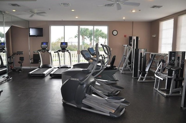 gym with recessed lighting, a ceiling fan, and visible vents