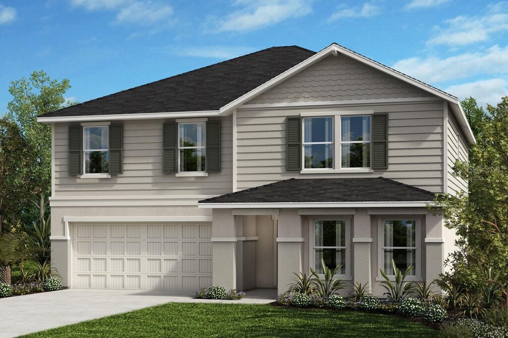37630 Mackenzie Dr, Zephyrhills, FL 33540 - view of front facade with an attached garage, concrete driveway, and roof with shingles