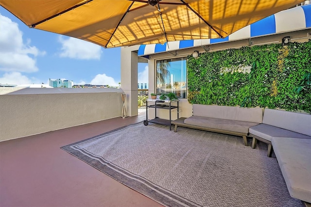 view of patio / terrace featuring a balcony