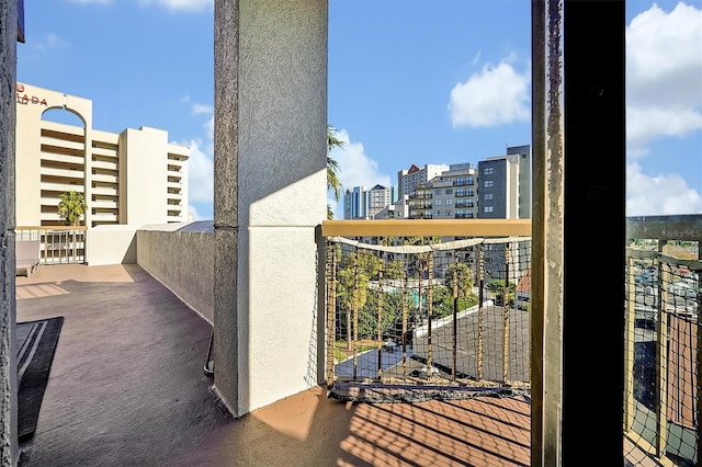 balcony featuring a view of city