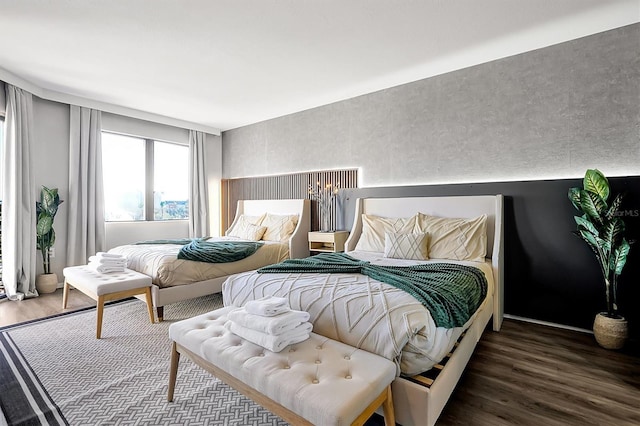 bedroom featuring wood finished floors