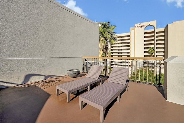 view of patio with a balcony