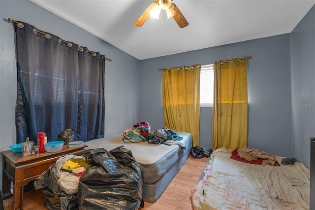 bedroom featuring ceiling fan and wood finished floors