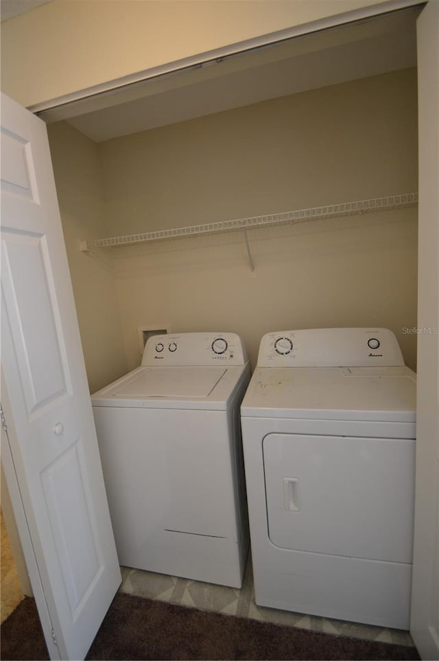 laundry area featuring washer and dryer and laundry area