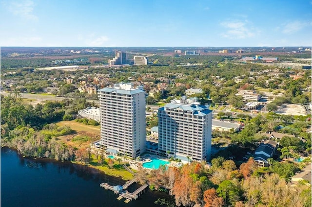 aerial view featuring a view of city and a water view