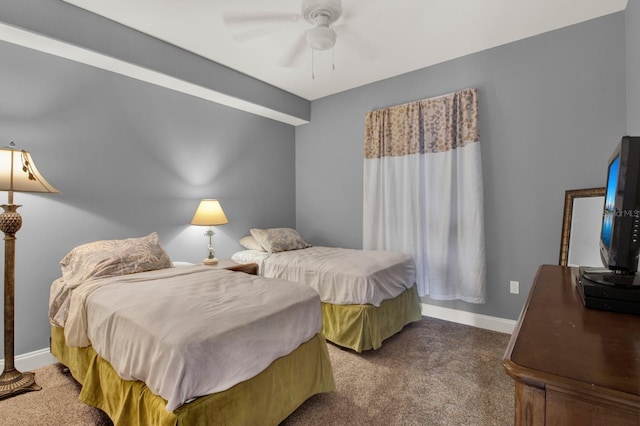 carpeted bedroom featuring baseboards and ceiling fan