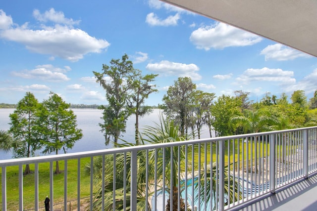 balcony featuring a water view