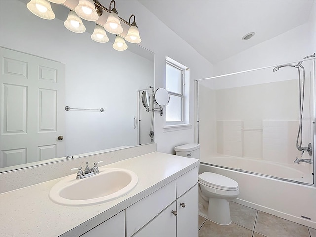 full bath with tile patterned floors, toilet,  shower combination, vanity, and vaulted ceiling