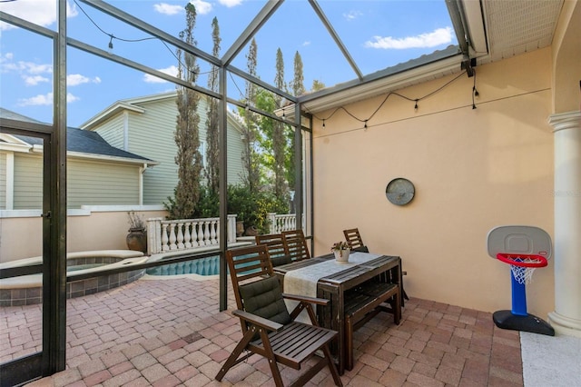 view of patio / terrace featuring a lanai and an outdoor pool