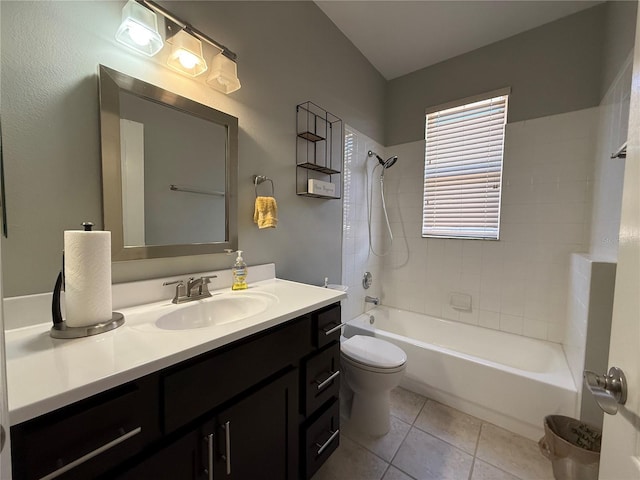 bathroom featuring tile patterned floors, toilet, tub / shower combination, and vanity