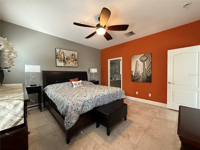 bedroom featuring baseboards, visible vents, lofted ceiling, ceiling fan, and a textured ceiling