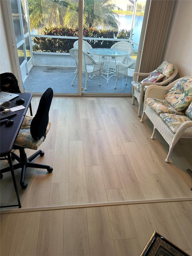 office space with wood finished floors